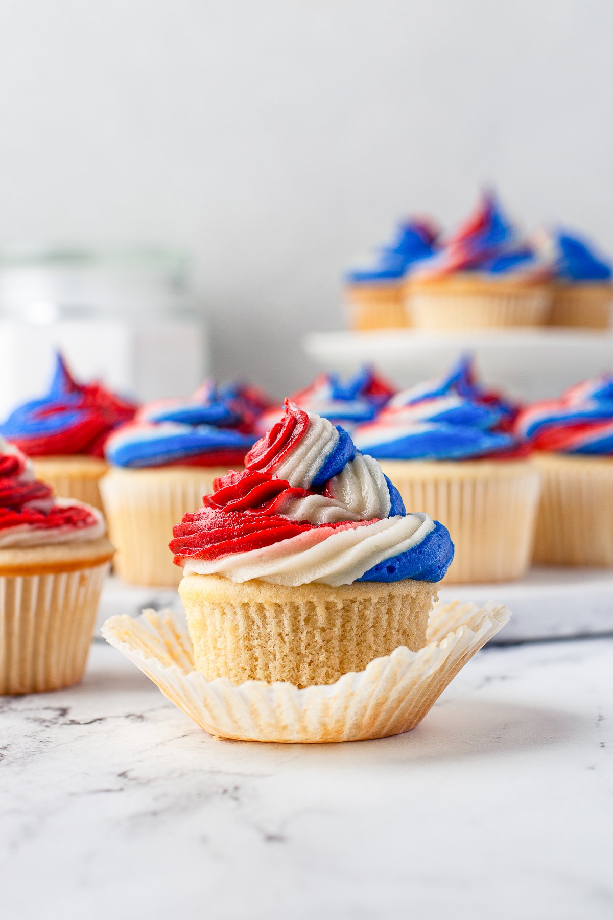 One Patriotic Cupcake with paper liner pulled down.