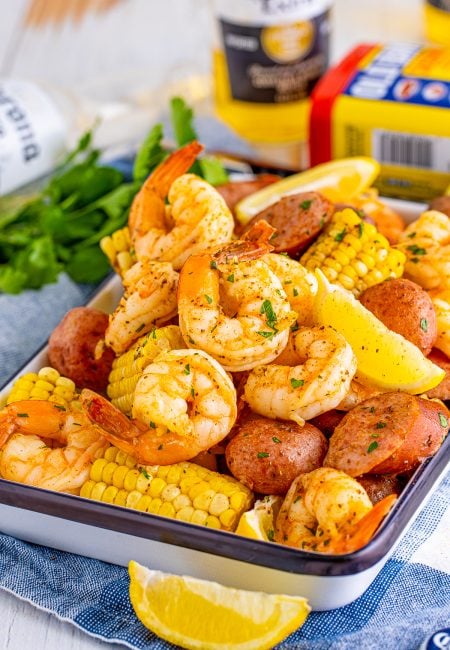 Shrimp Boil on tray with ingredients stacked on top of on another.