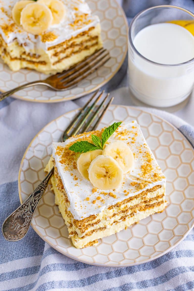Overhead slice of a slice of icebox cake overhead showing toppings.