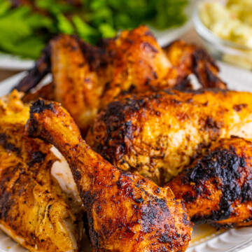 Stacked Beer Can Chicken on plate.