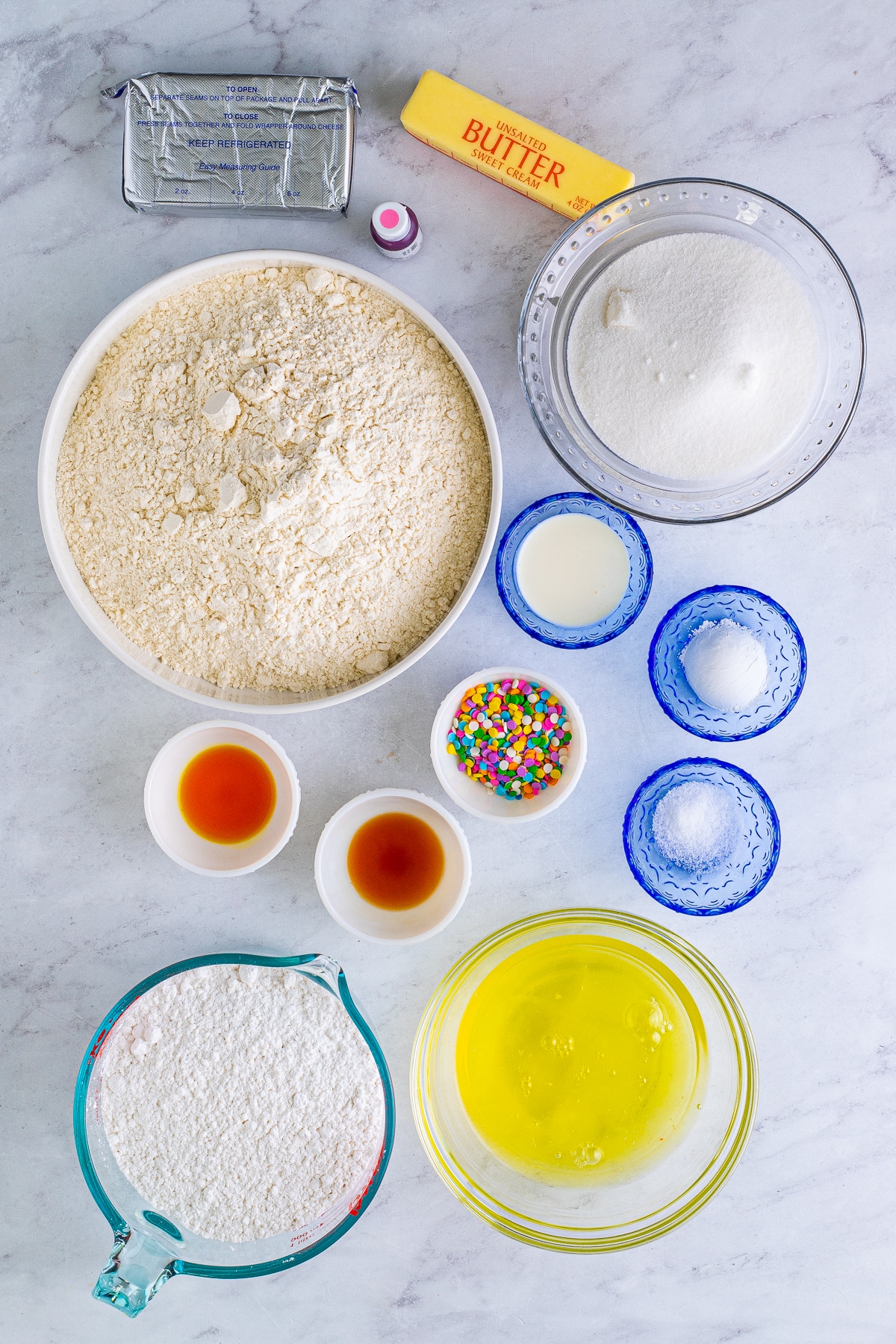Ingredients needed to make Confetti Cake Cookies.