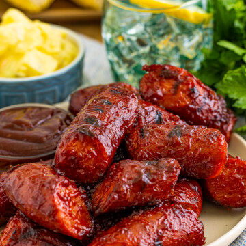 Close up of Smoked Kielbasa on plate showing char marks.
