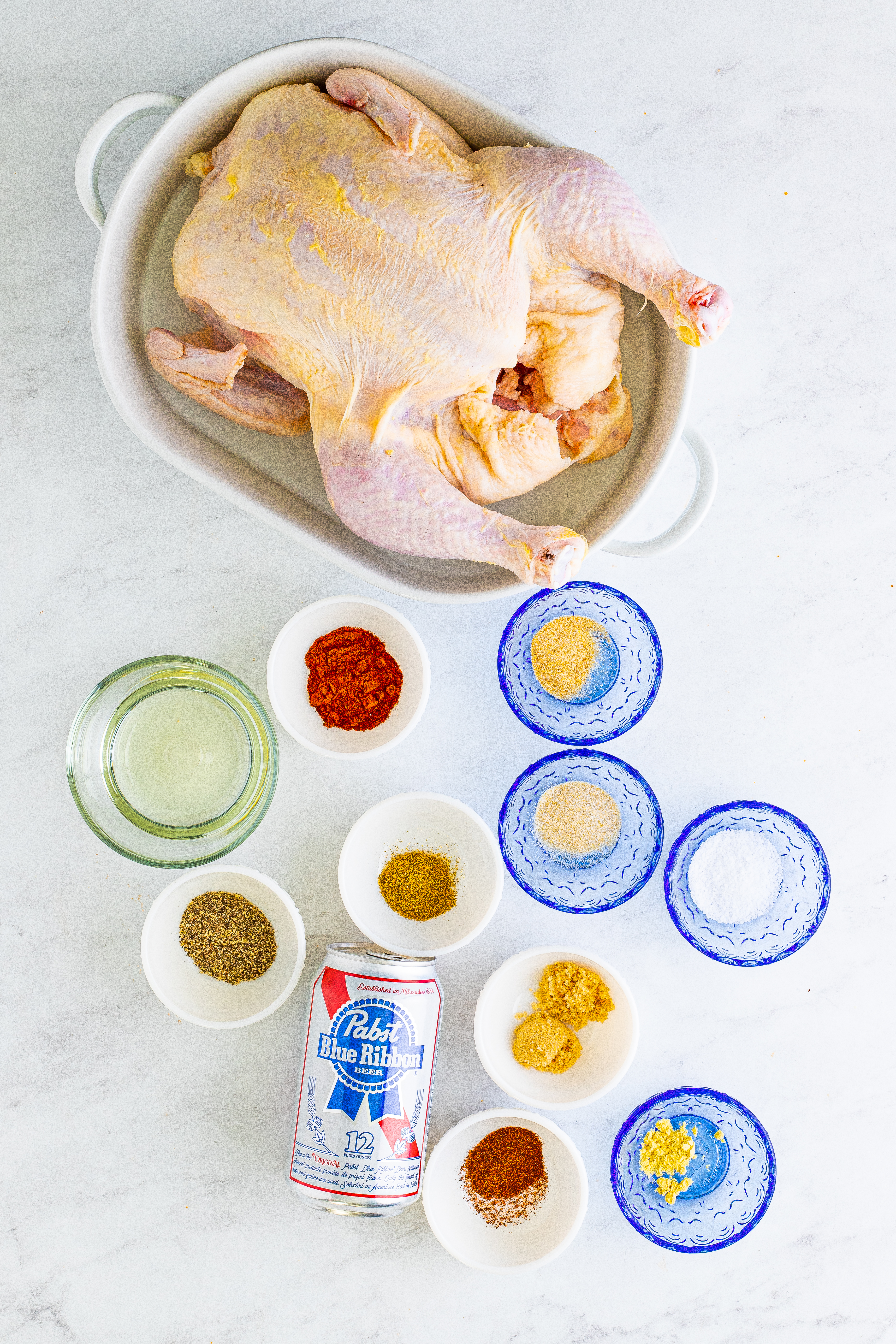 Ingredients needed to make Beer Can Chicken.