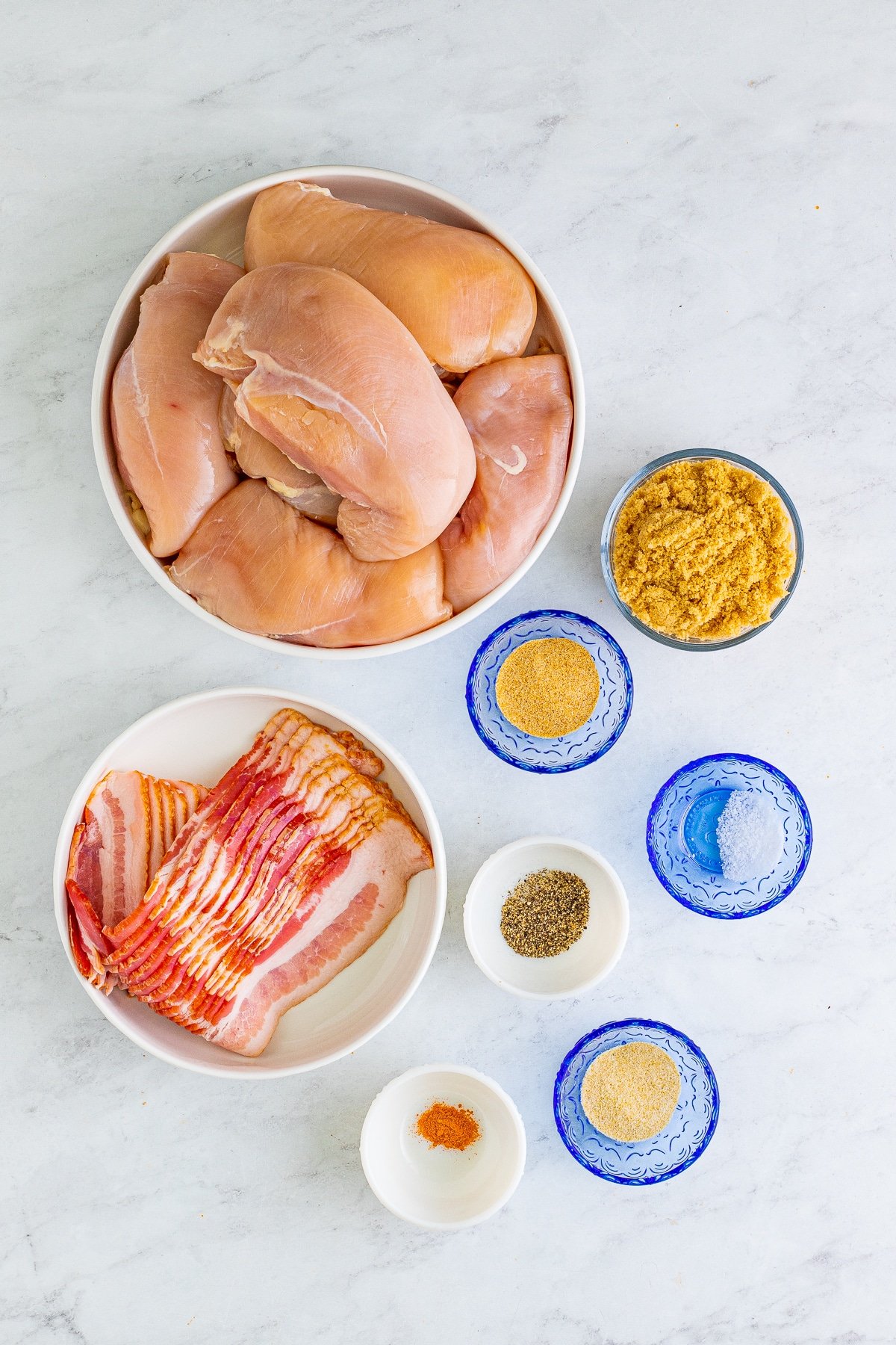 Ingredients needed to make Brown Sugar Bacon Wrapped Chicken.