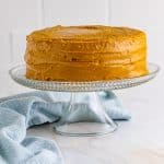 Finished Homemade Caramel Cake on cake stand.