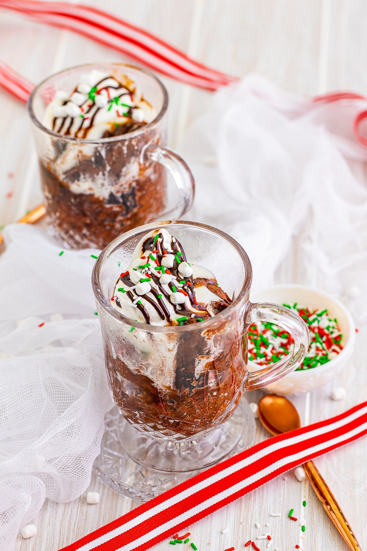 Two Hot Chocolate Mug Cakes in glasses.