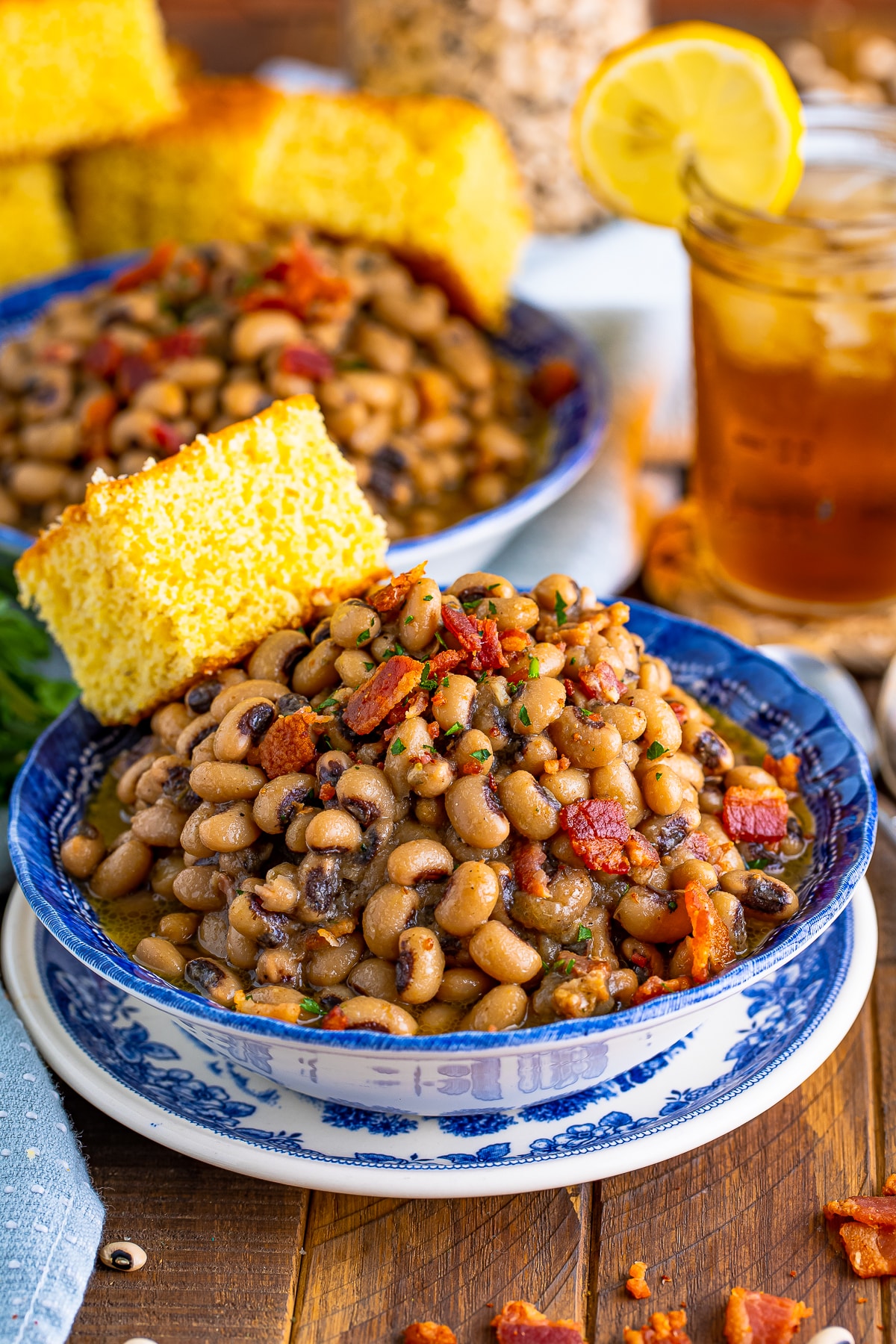 Finished Bacon Black Eyed Peas in bowls with cornbread.