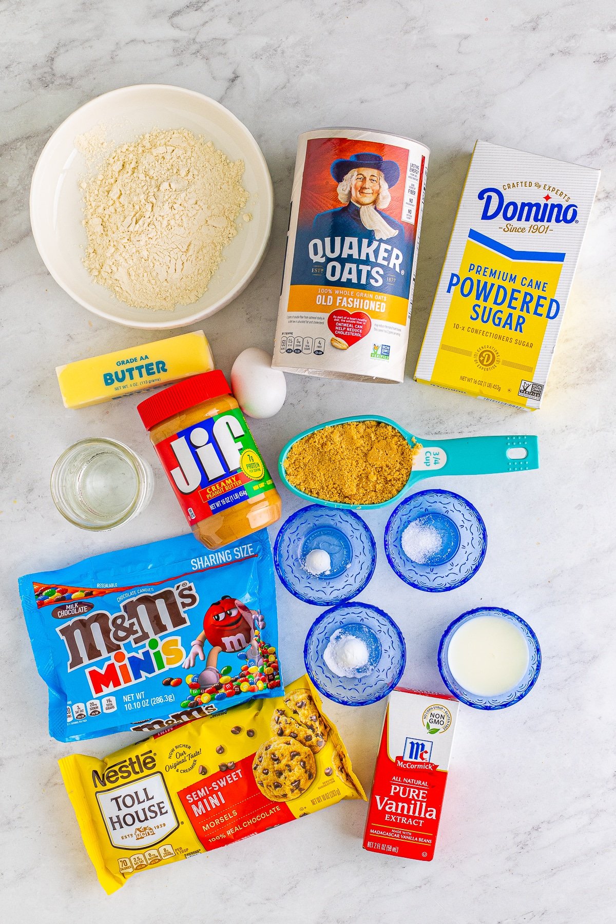 Ingredients needed to make Monster Cookie Cupcakes.