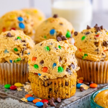 Close up of one of the Monster Cookie Cupcakes on metal tin.