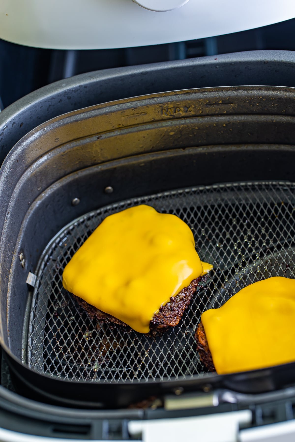 bubba burgers with melted cheese in an air fryer