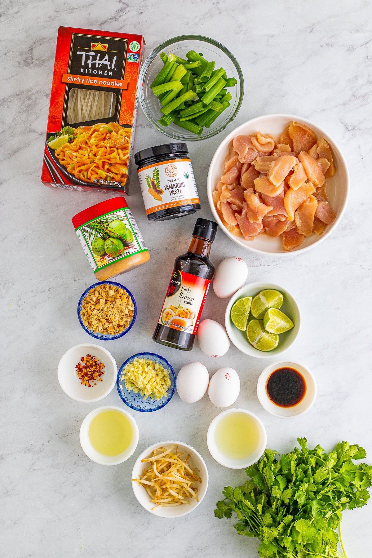 Overhead image of ingredients needed to make spicy pad thai recipe with chicken