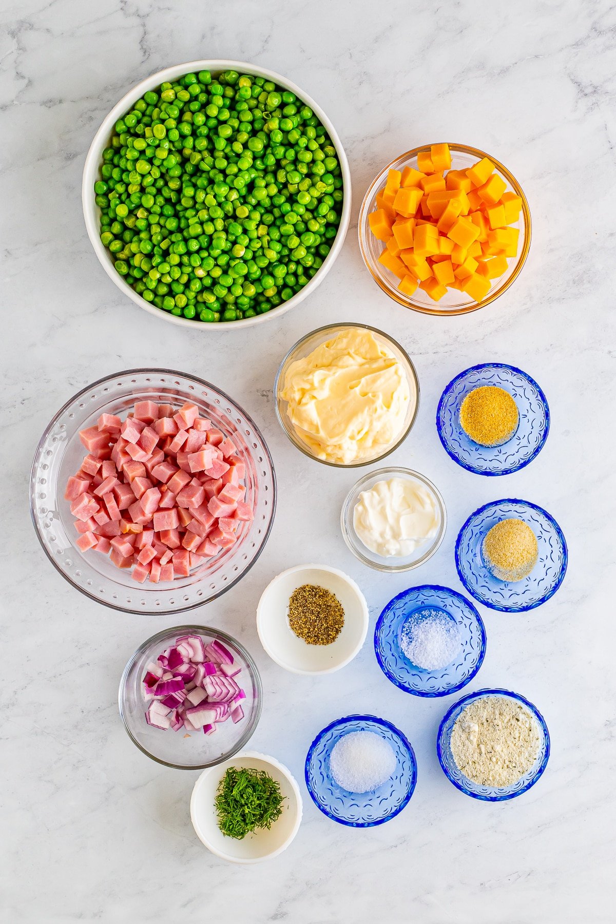 overhead image showing the ingredients needed to make green pea salad