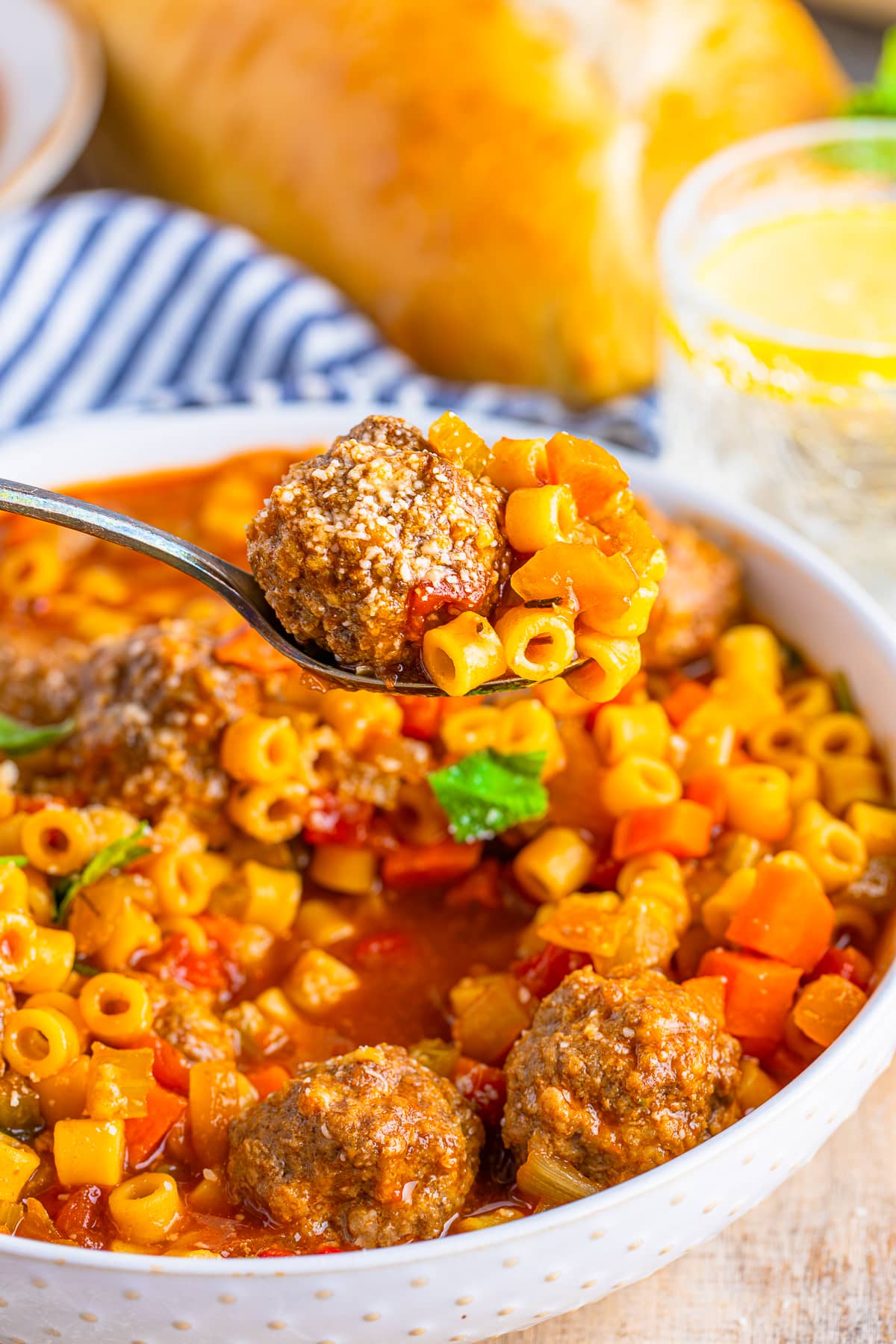 meatball soup recipe on a soup spoon over a bowl