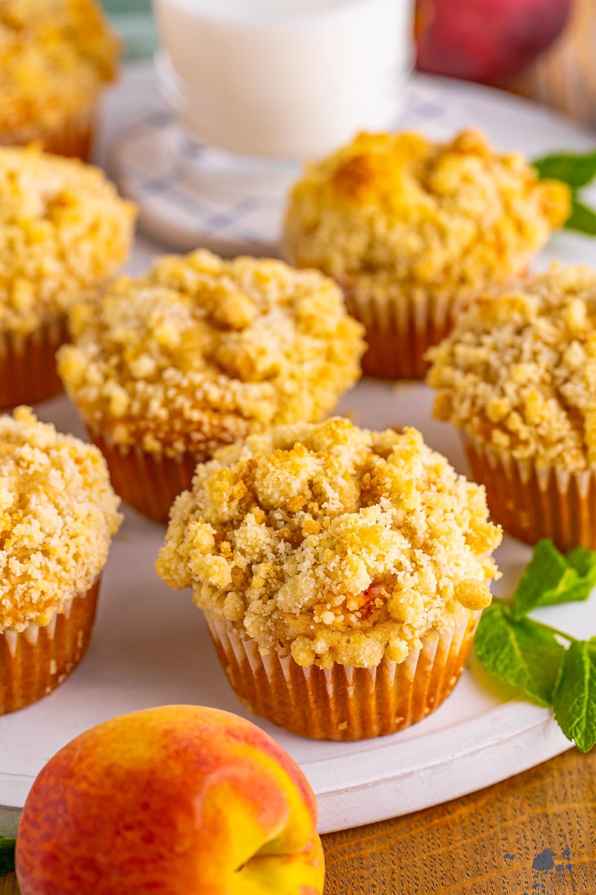 peach muffins recipe on a white serving platter