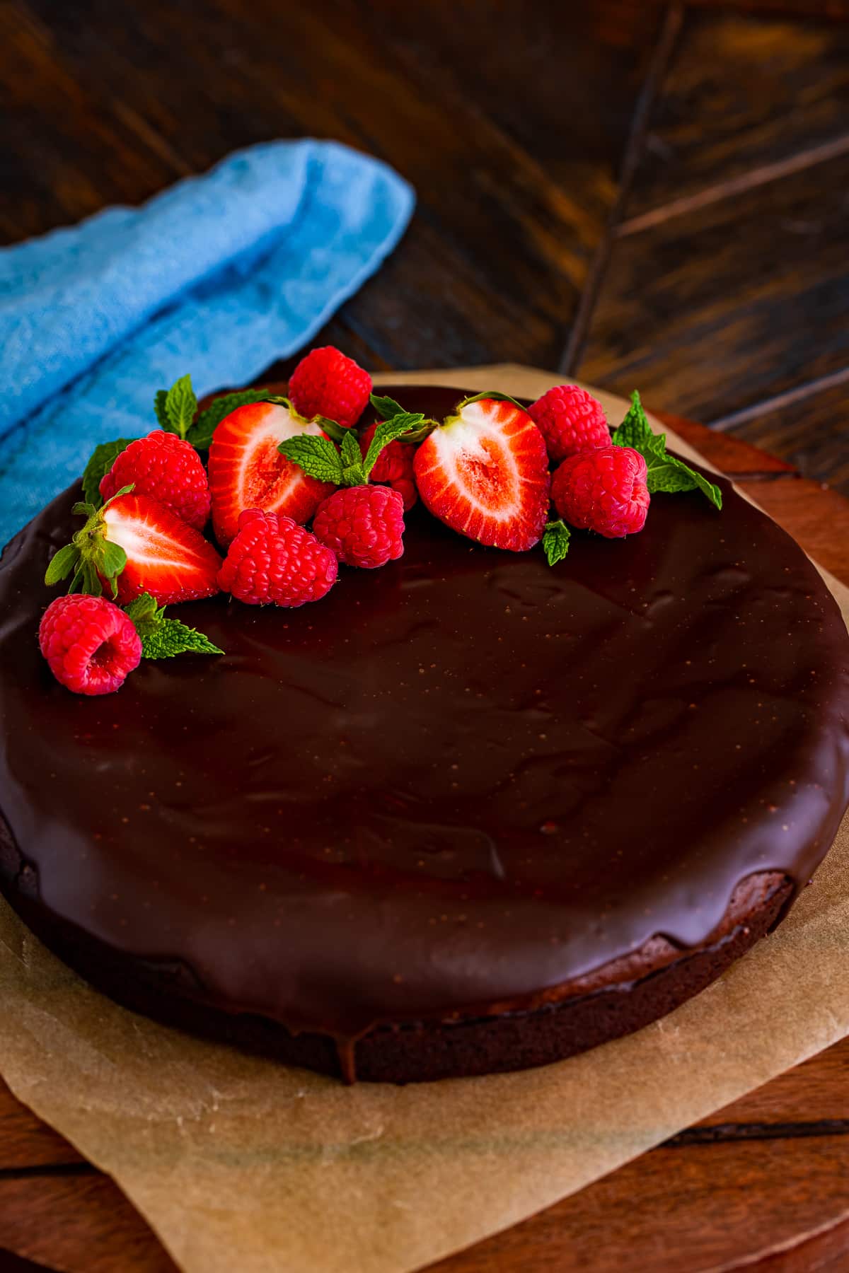 flourless chocolate cake recipe on a wooden serving platter