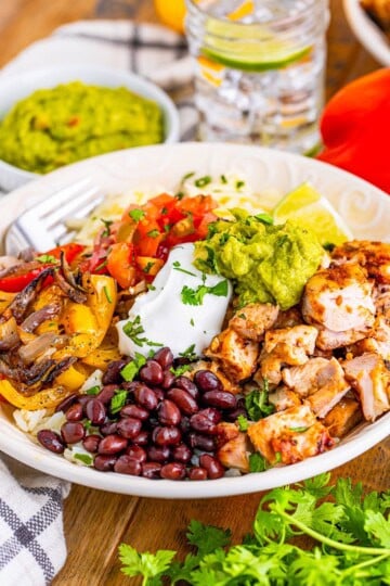 Chipotle chicken marinade whisked together in a bowl with chipotle in adobo, honey, lime, and spices for a Chipotle Bowl Recipe.