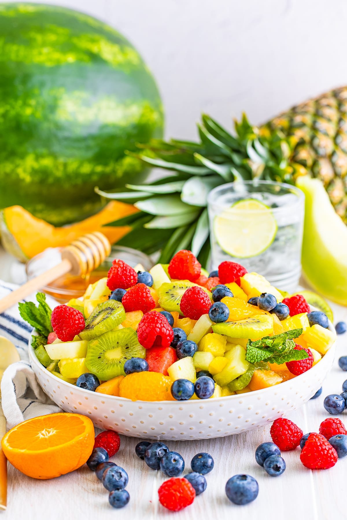tropical fruit salad in a white bowl