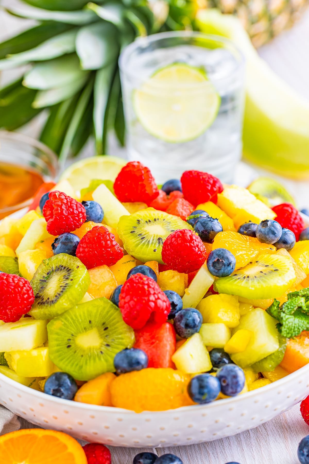 tropical fruit salad in a white bowl