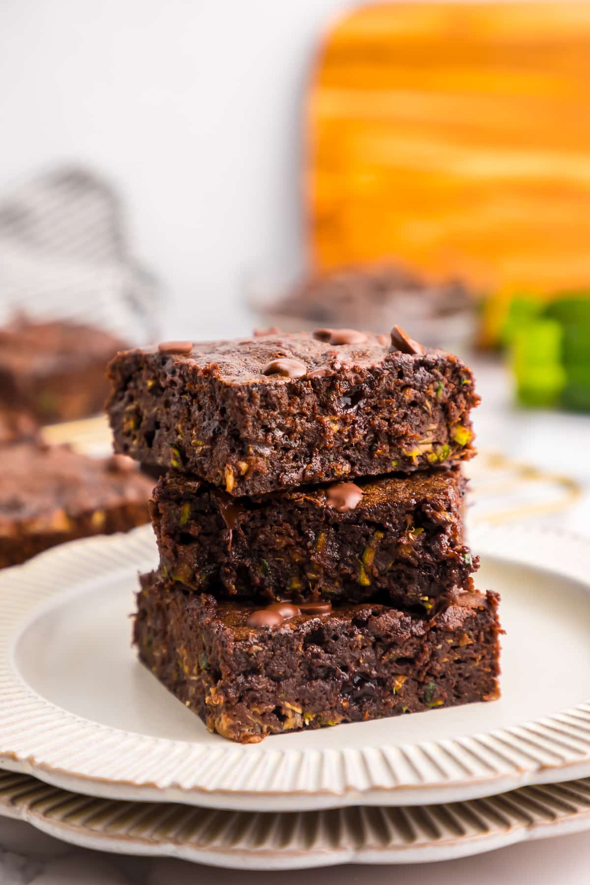 zucchini bars stacked on a plate