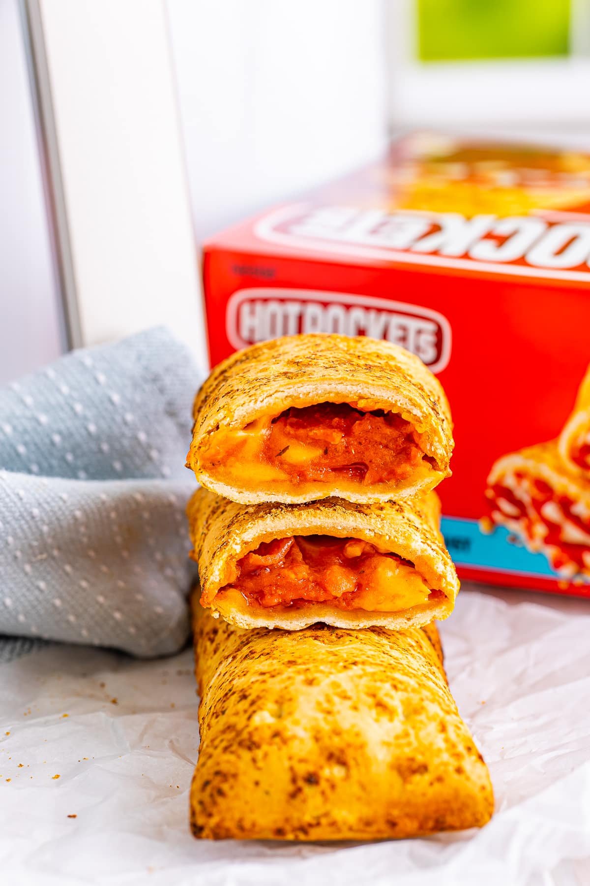 hot pockets in air fryer stacked to show filling