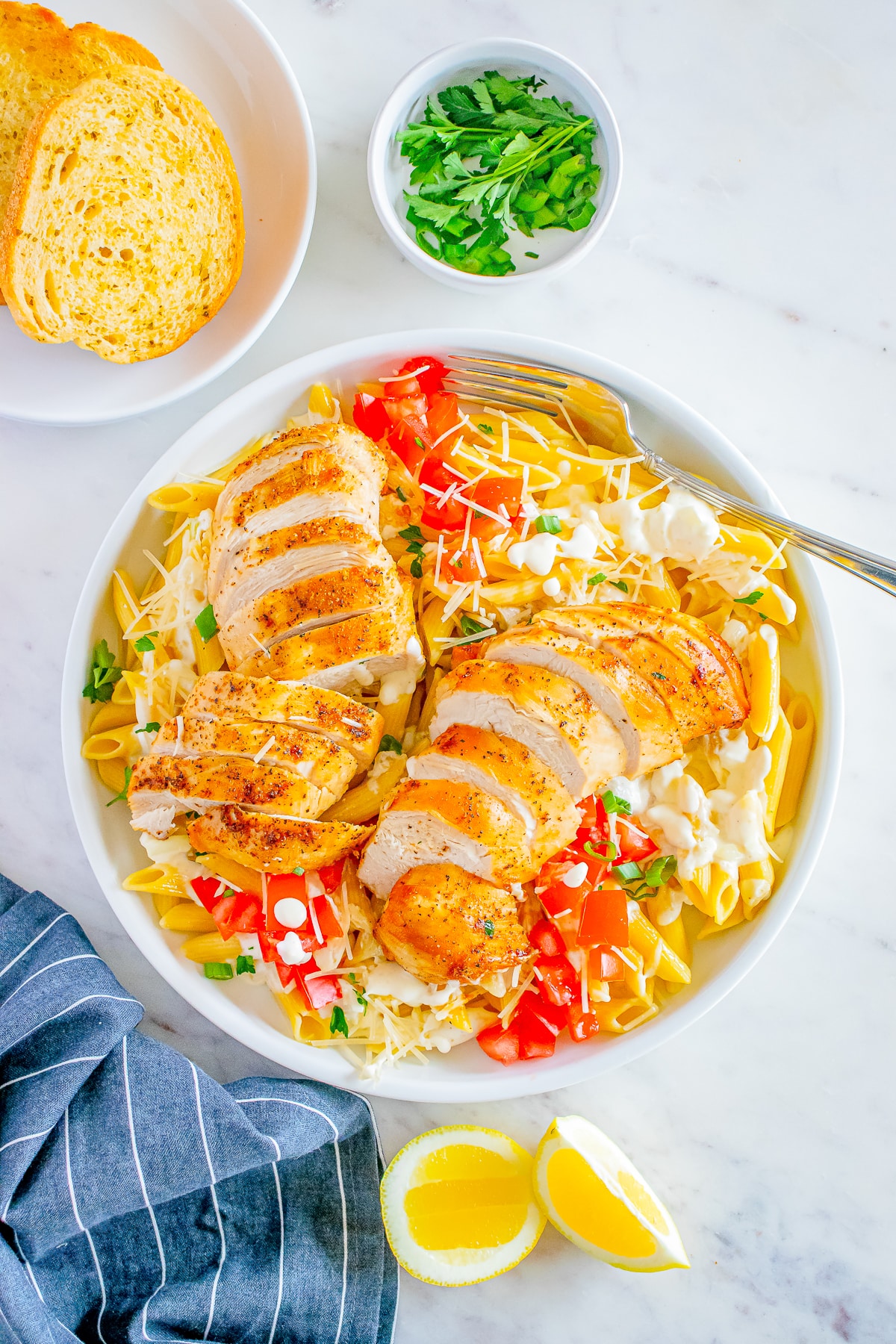 cajun pasta recipe with chicken in a white bowl