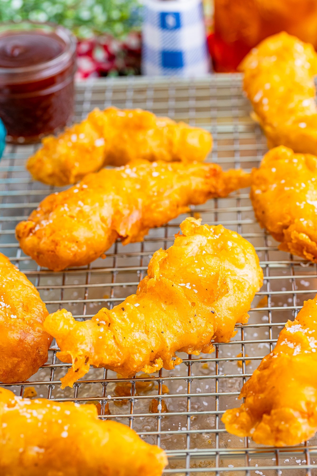 battered chicken tenders on a wire rack
