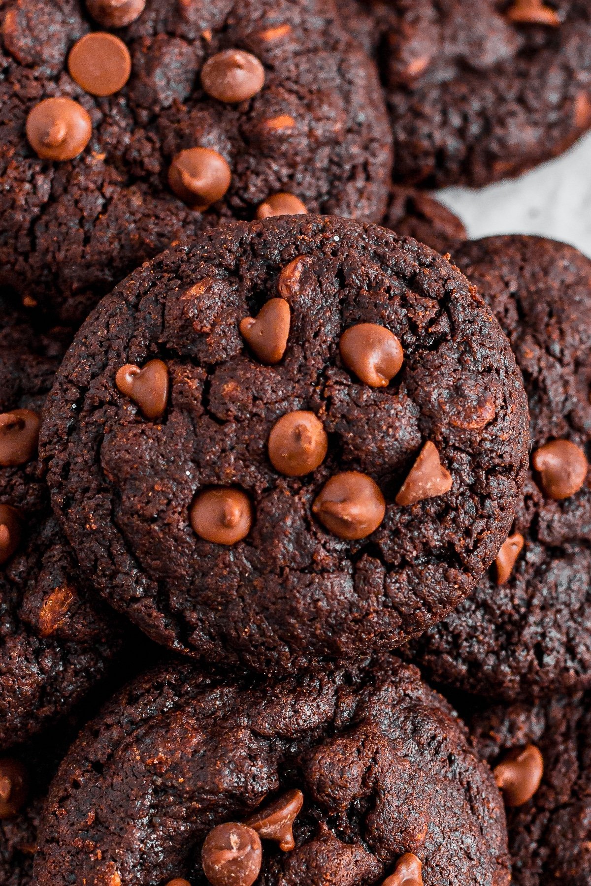 chewy double chocolate chip cookies overhead image close up