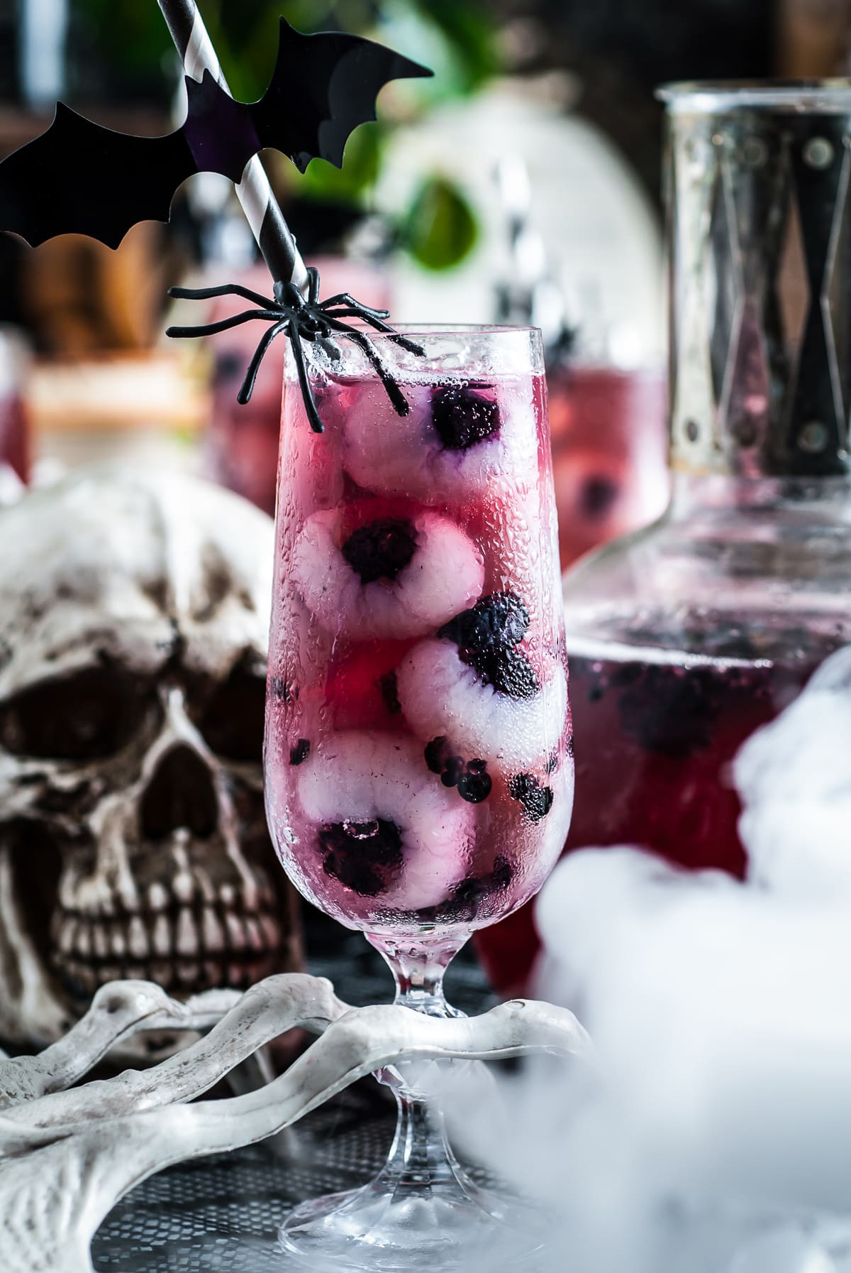 halloween punch in a tall glass with smoke