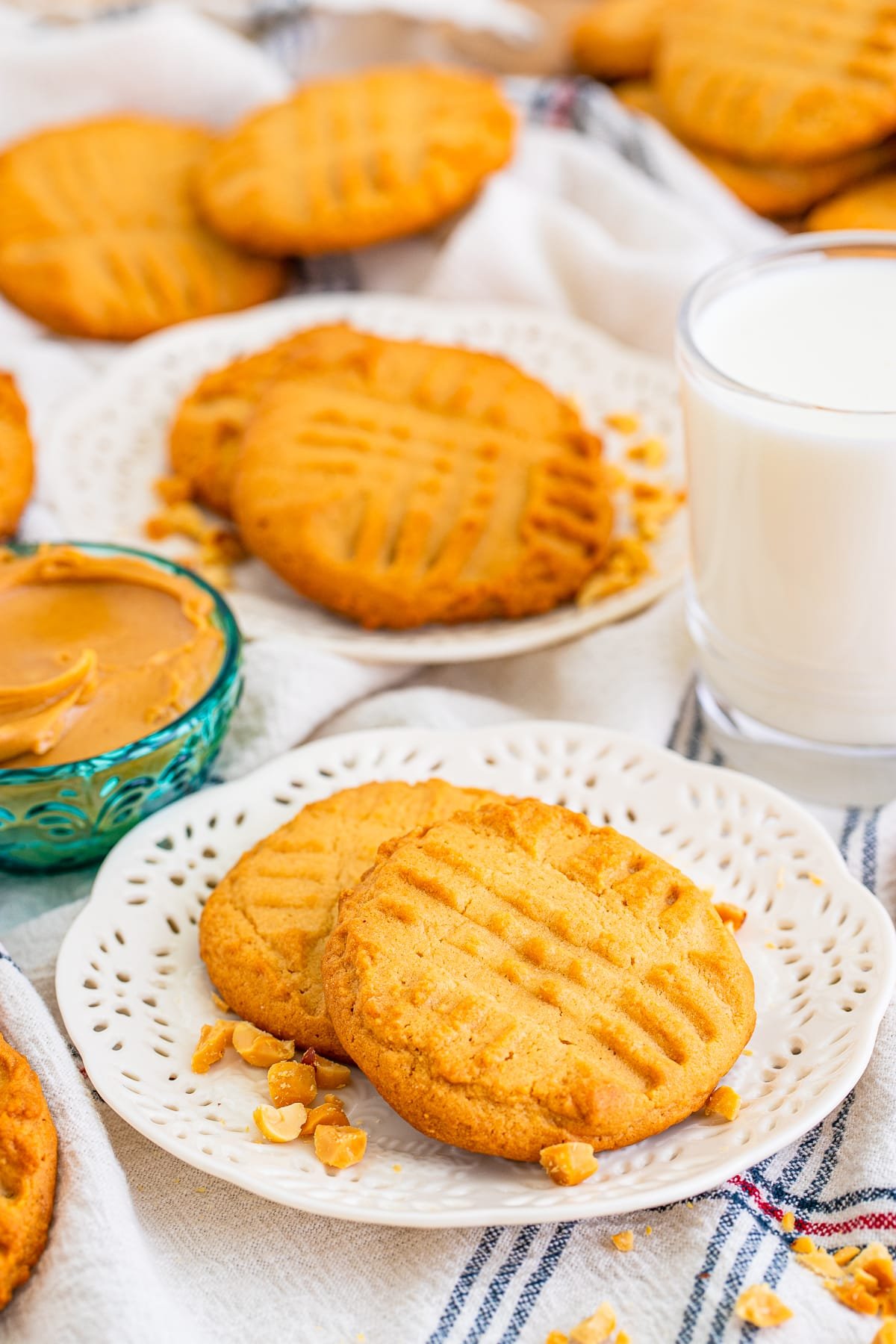crispy peanut butter cookies on a white plate