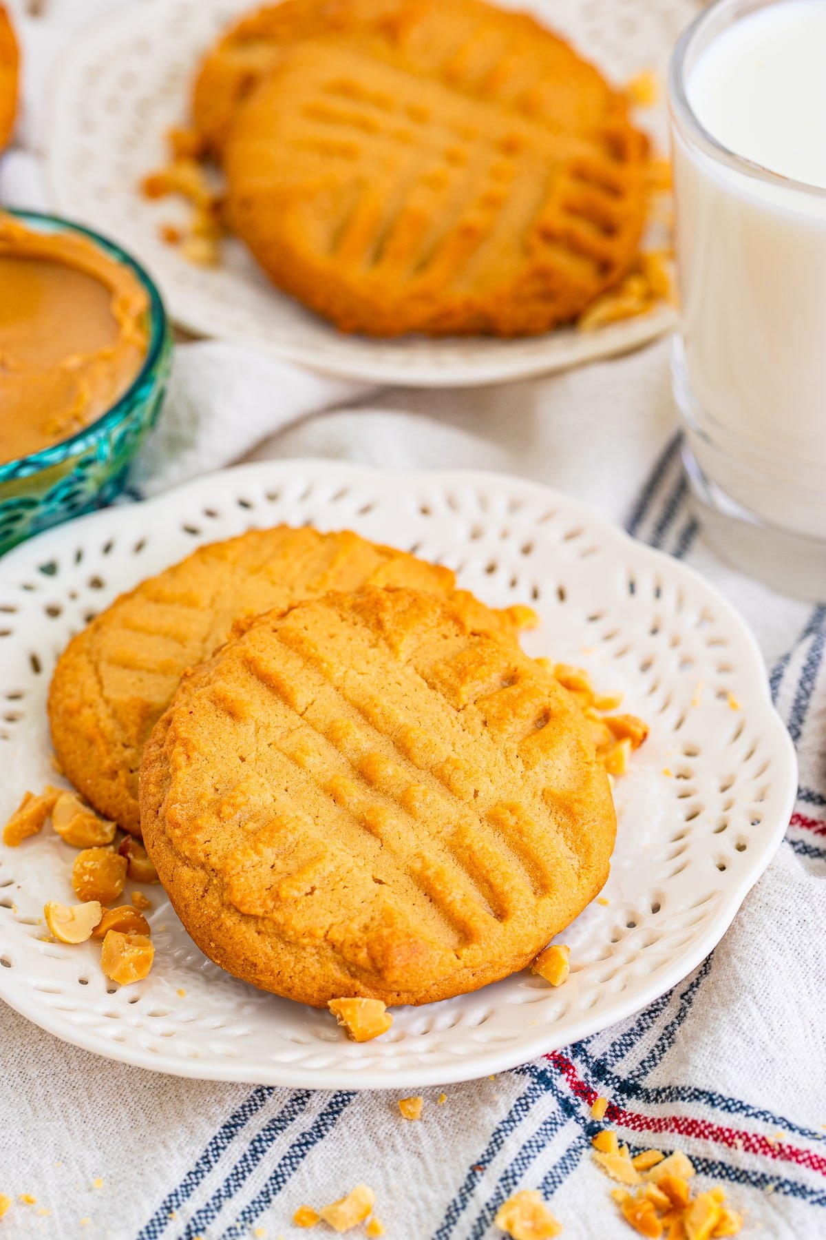 crispy peanut butter cookies on a white plate
