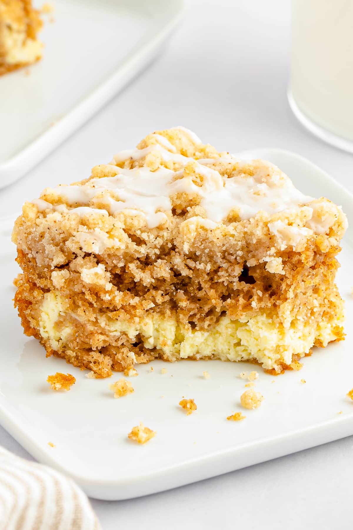slice of crumb cake with a bite taken out