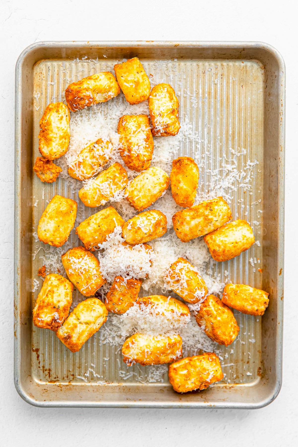 adding parmesan cheese to air fry tater tots