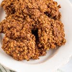 A plate piled with No Bake Cookies, chocolate peanut butter oatmeal cookies.