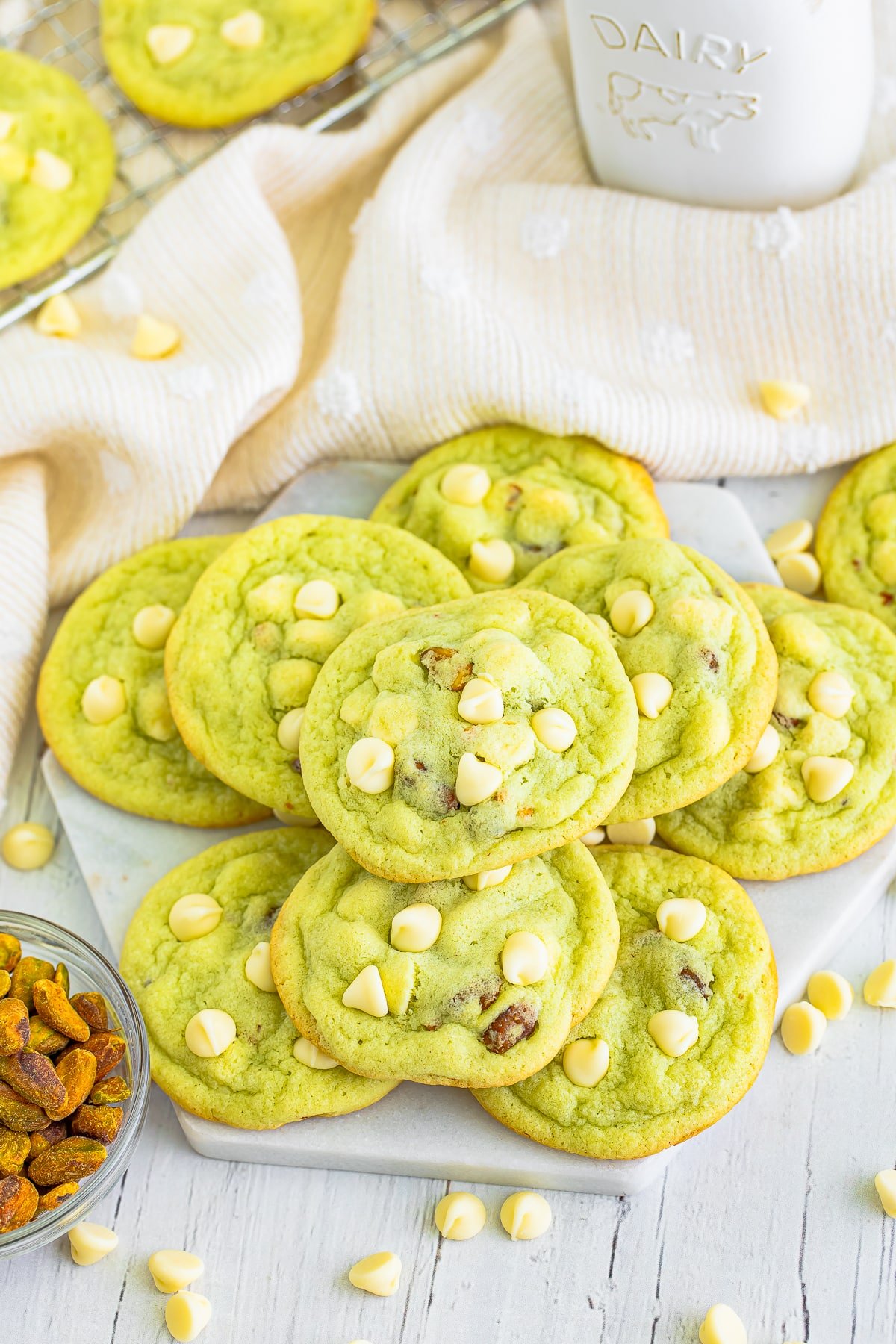 pistachio cookies on a white platter