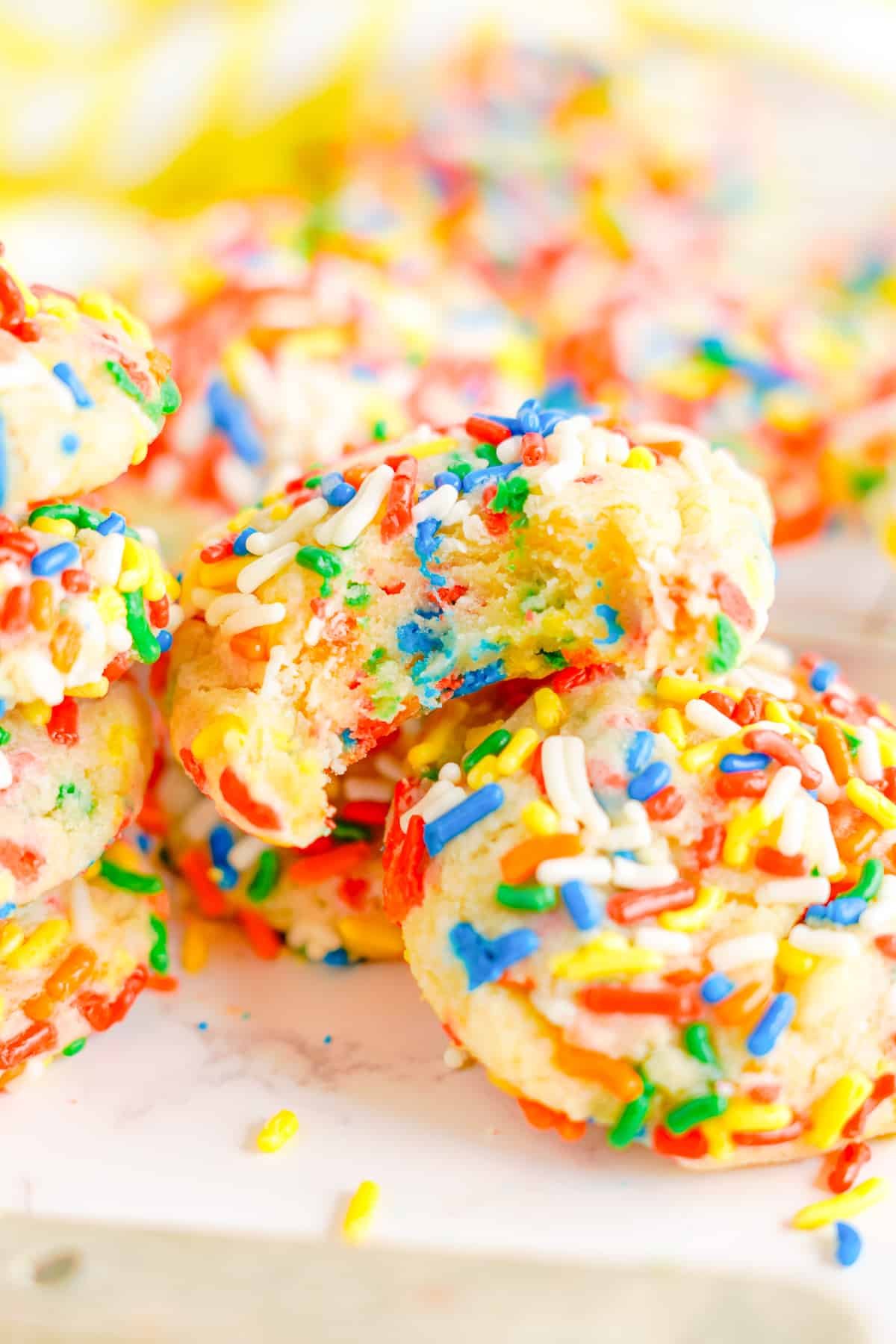 sprinkle cookies with a bite taken out