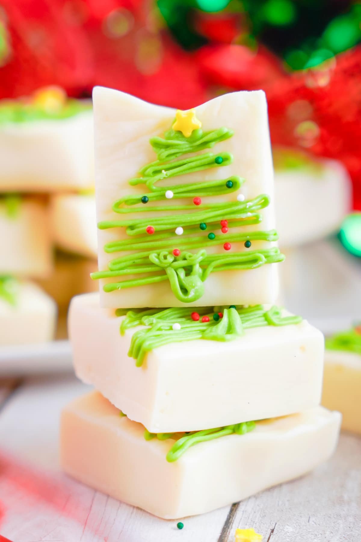 three pieces of christmas fudge stacked
