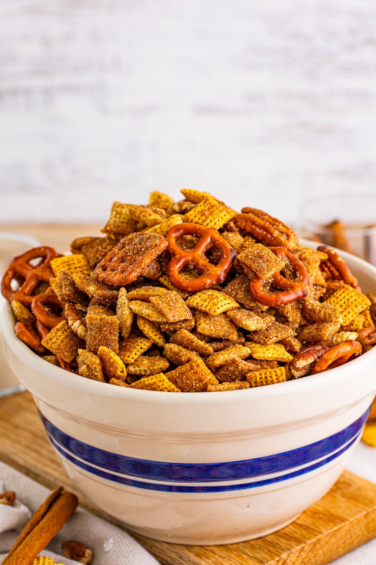 sweet chex mix recipe in a tan bowl