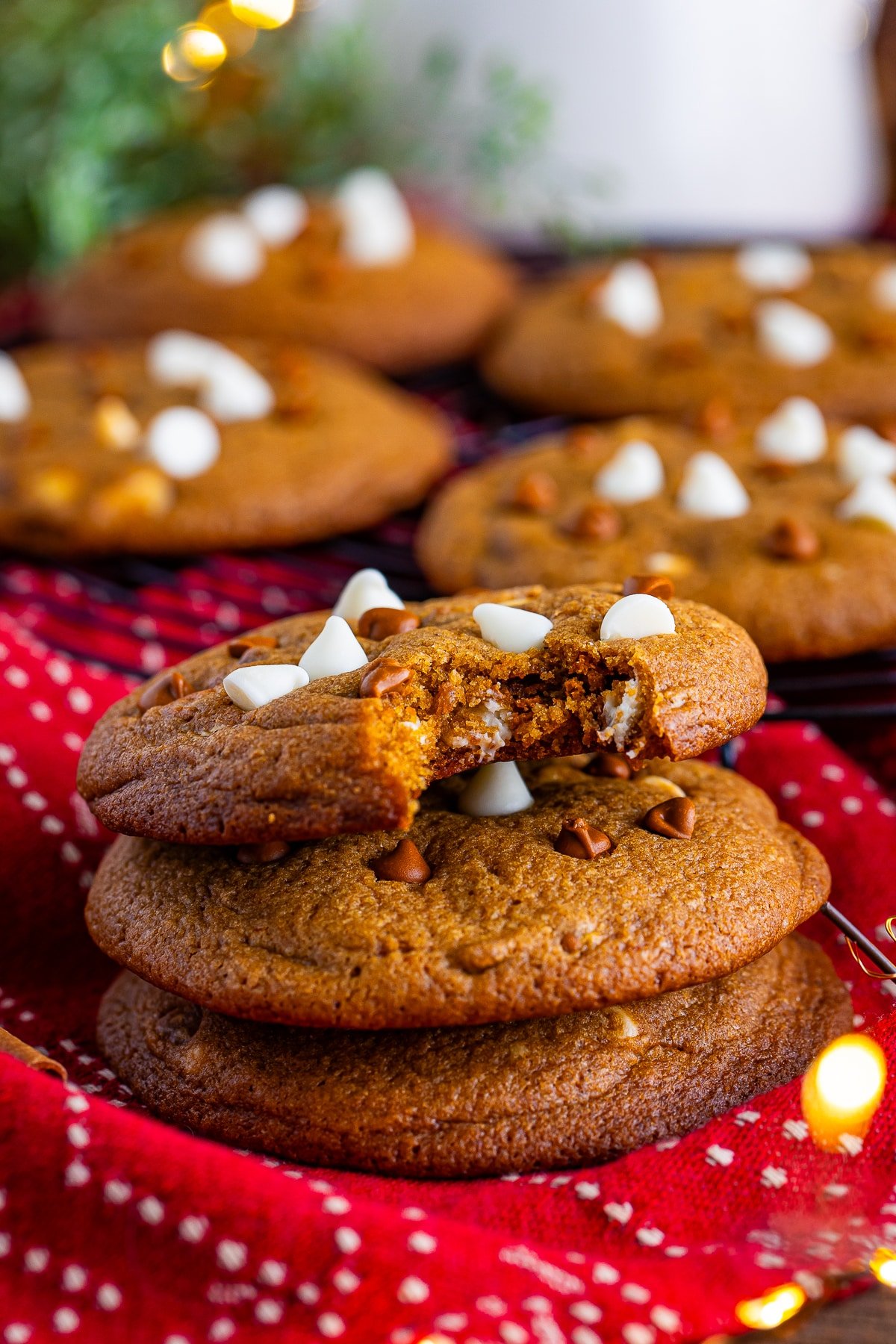 a stack of three soft gingerbread cookies recipe with a bite taken out