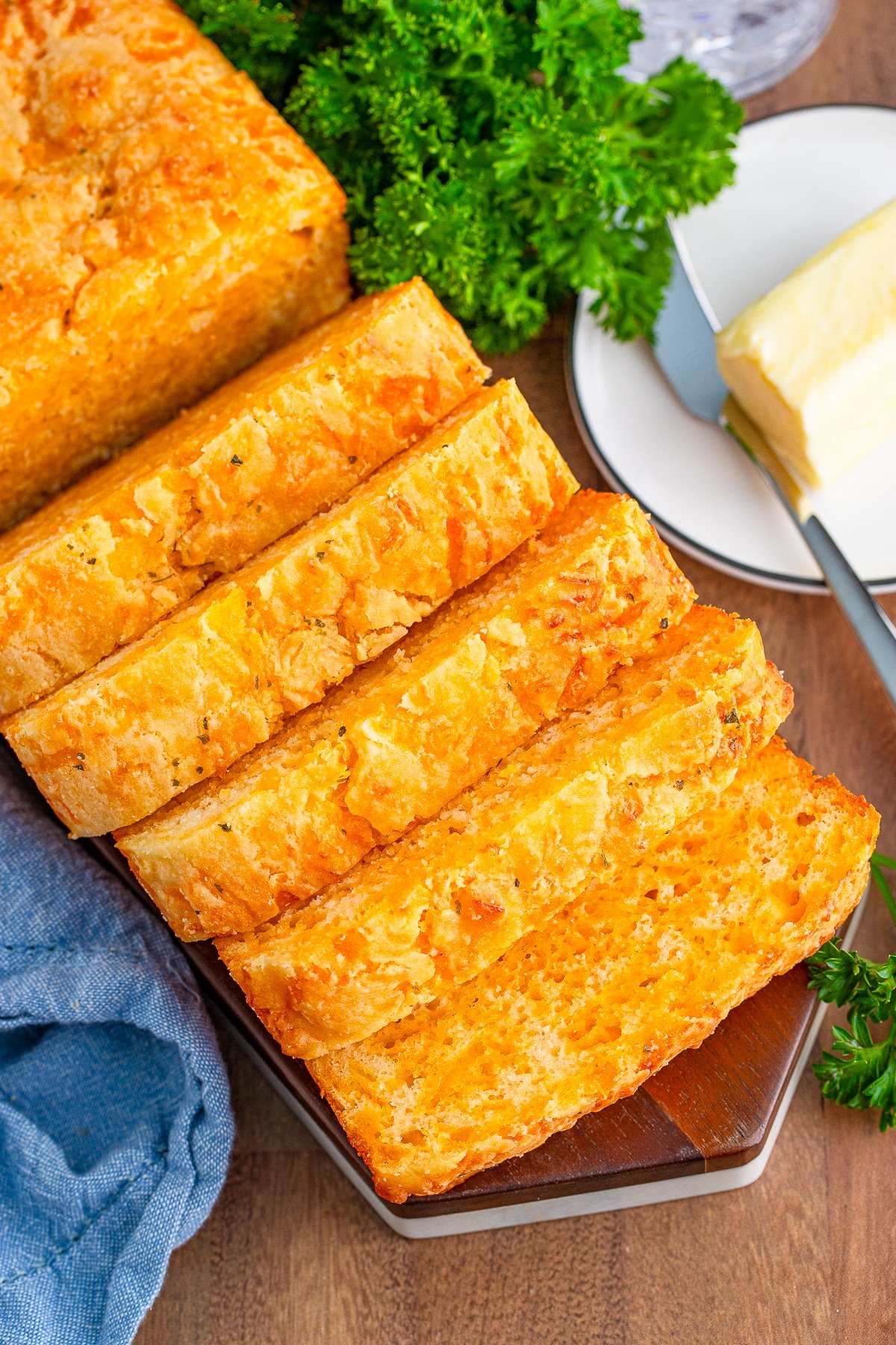 overhead image cheese bread recipe sliced on serving platter