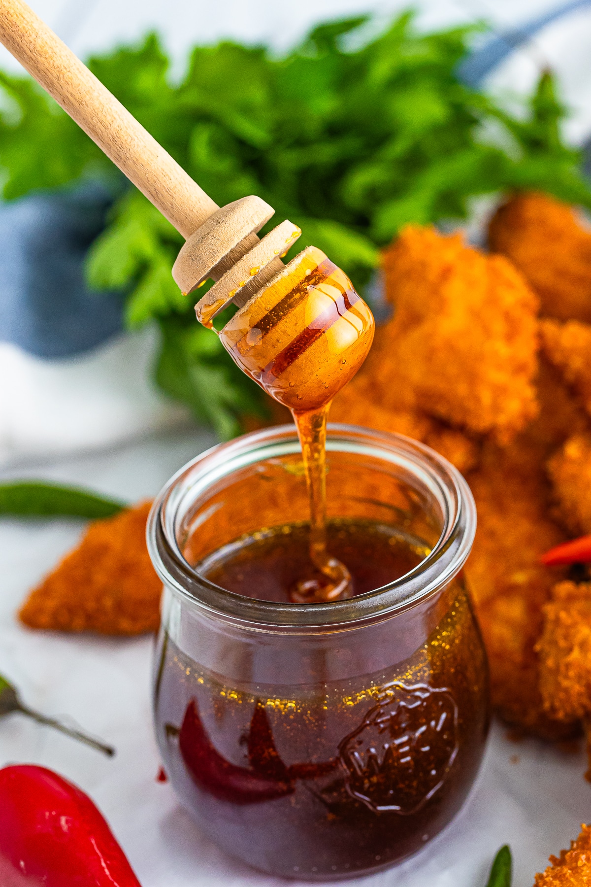 a honey dipper in hot honey recipe