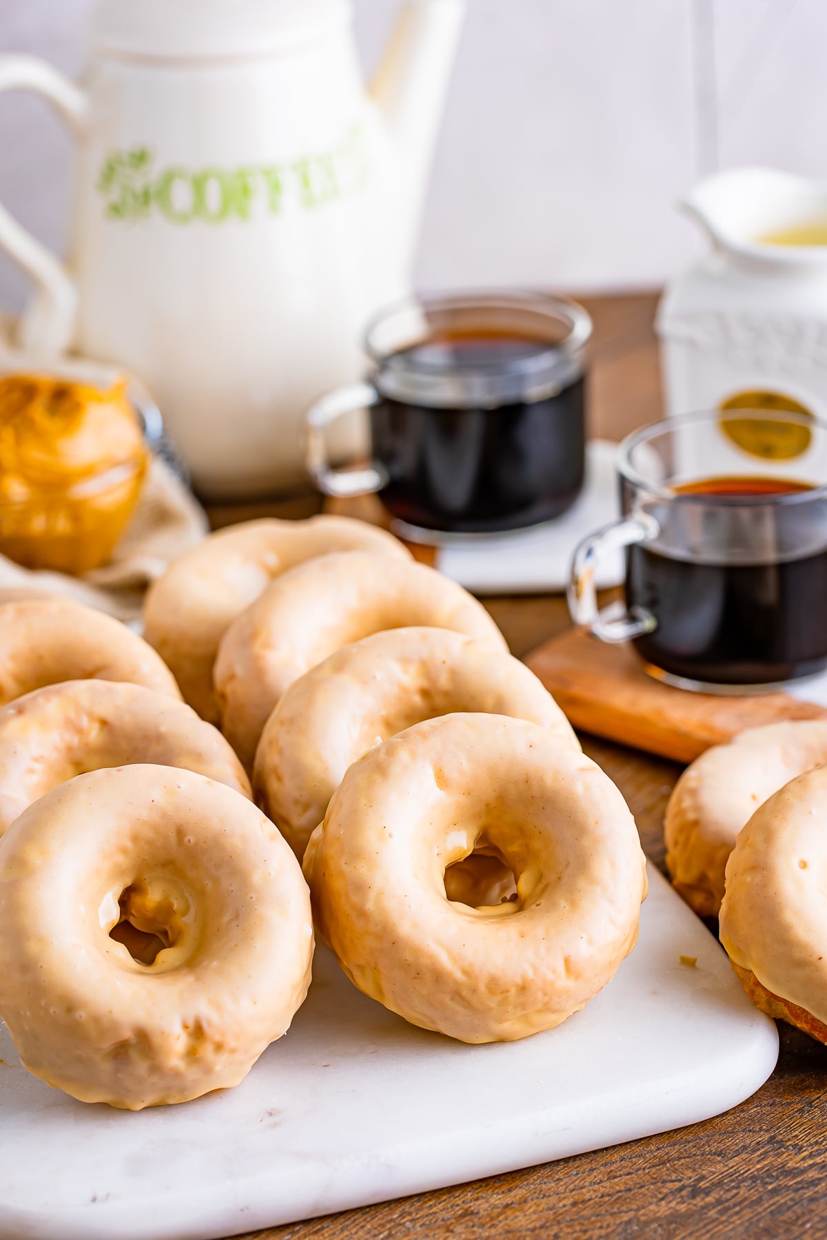peanut butter doughnuts on a white serving platter
