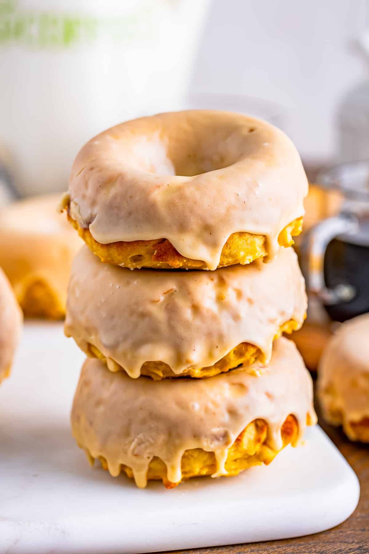 three peanut butter doughnuts stacked