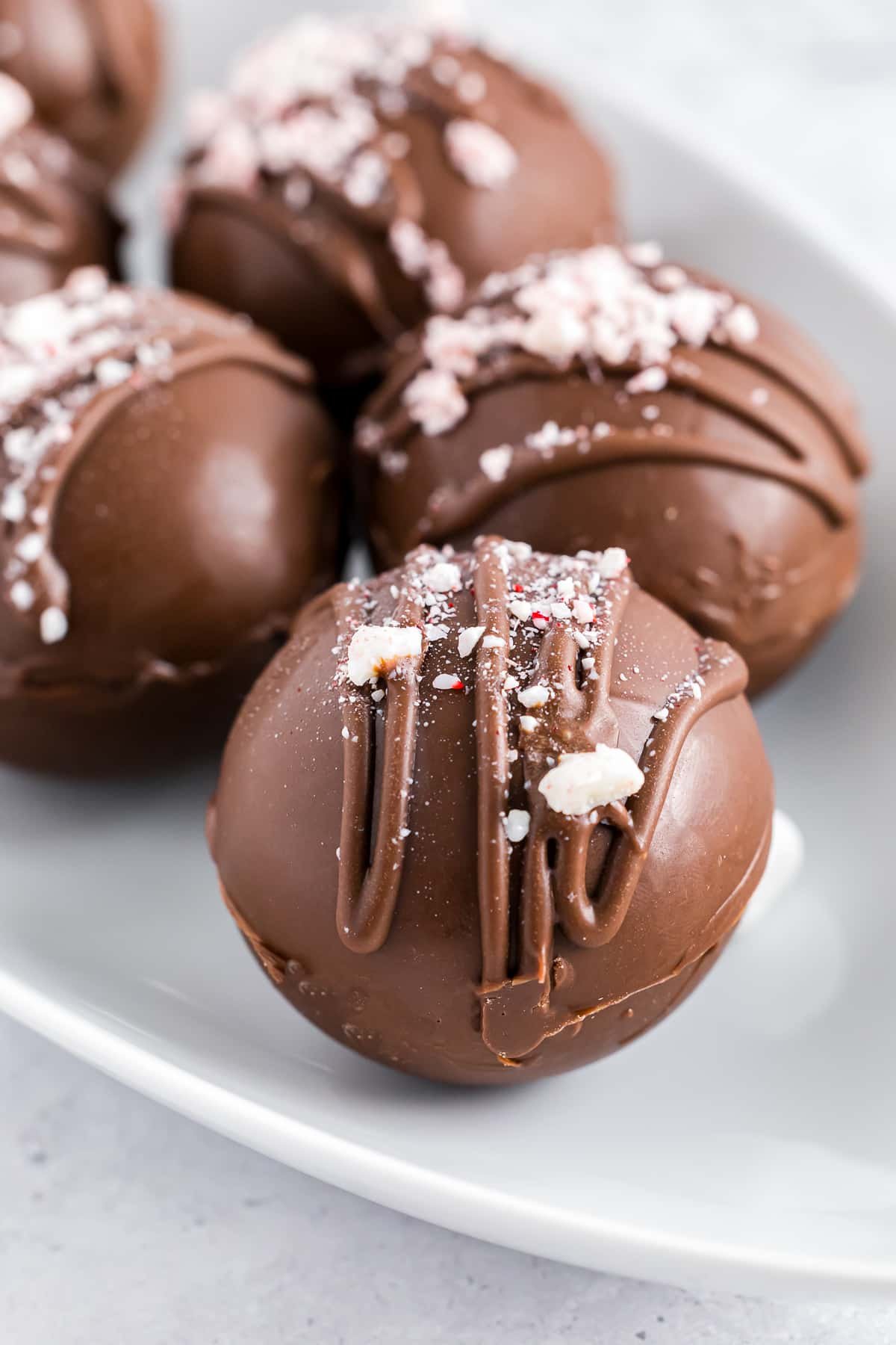 easy cocoa bombs recipe on a white plate
