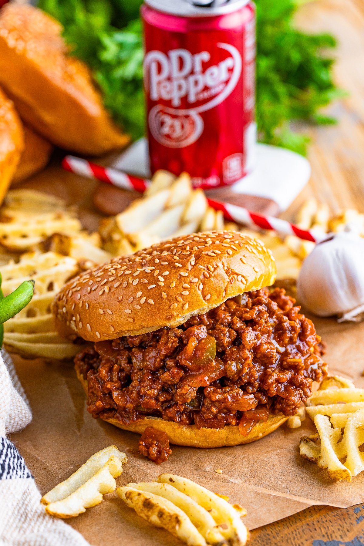 sloppy joes recipe on parchment paper with waffle fries