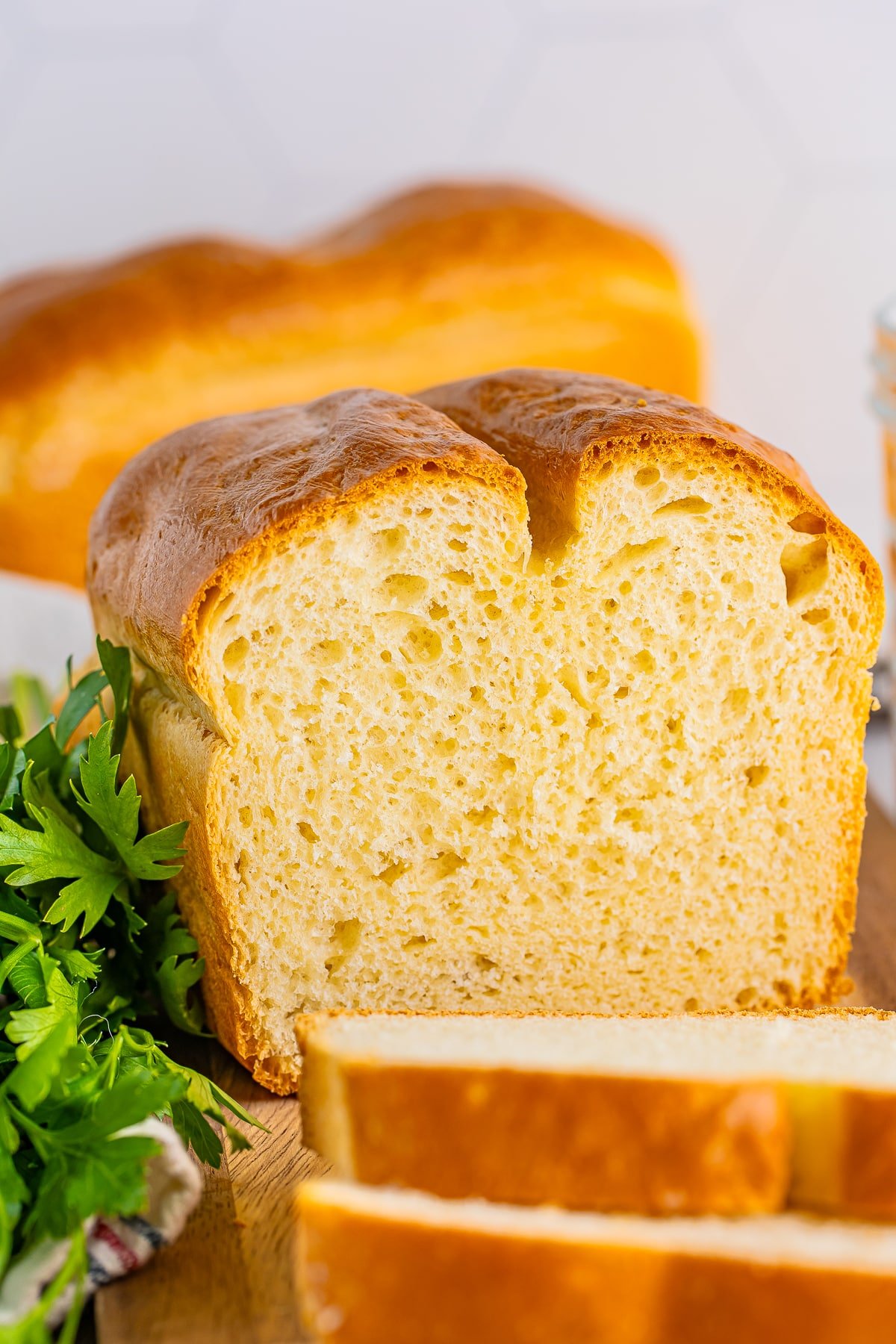 a loaf of white bread recipes with slices cut off