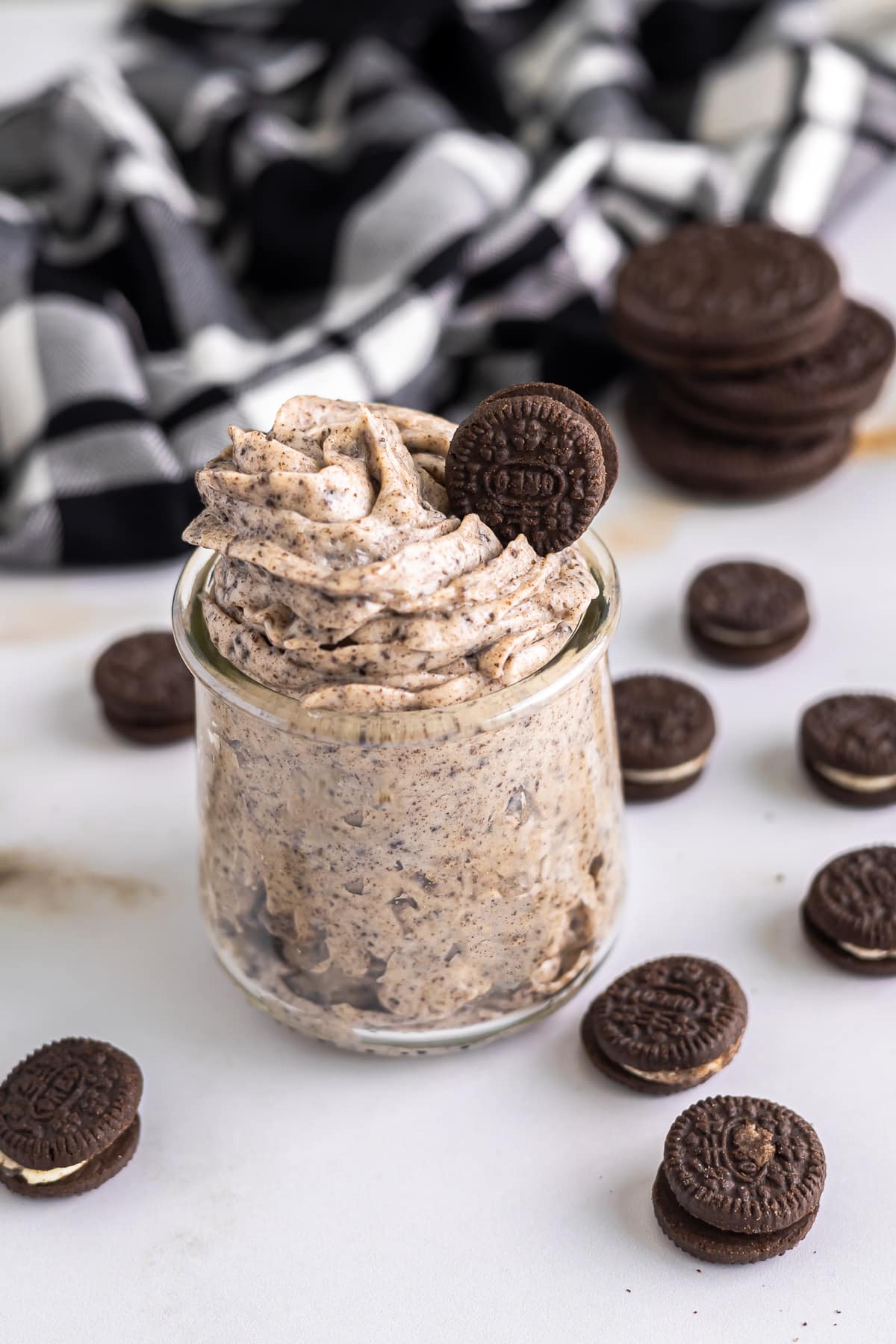 oreo buttercream frosting in a small glass jar