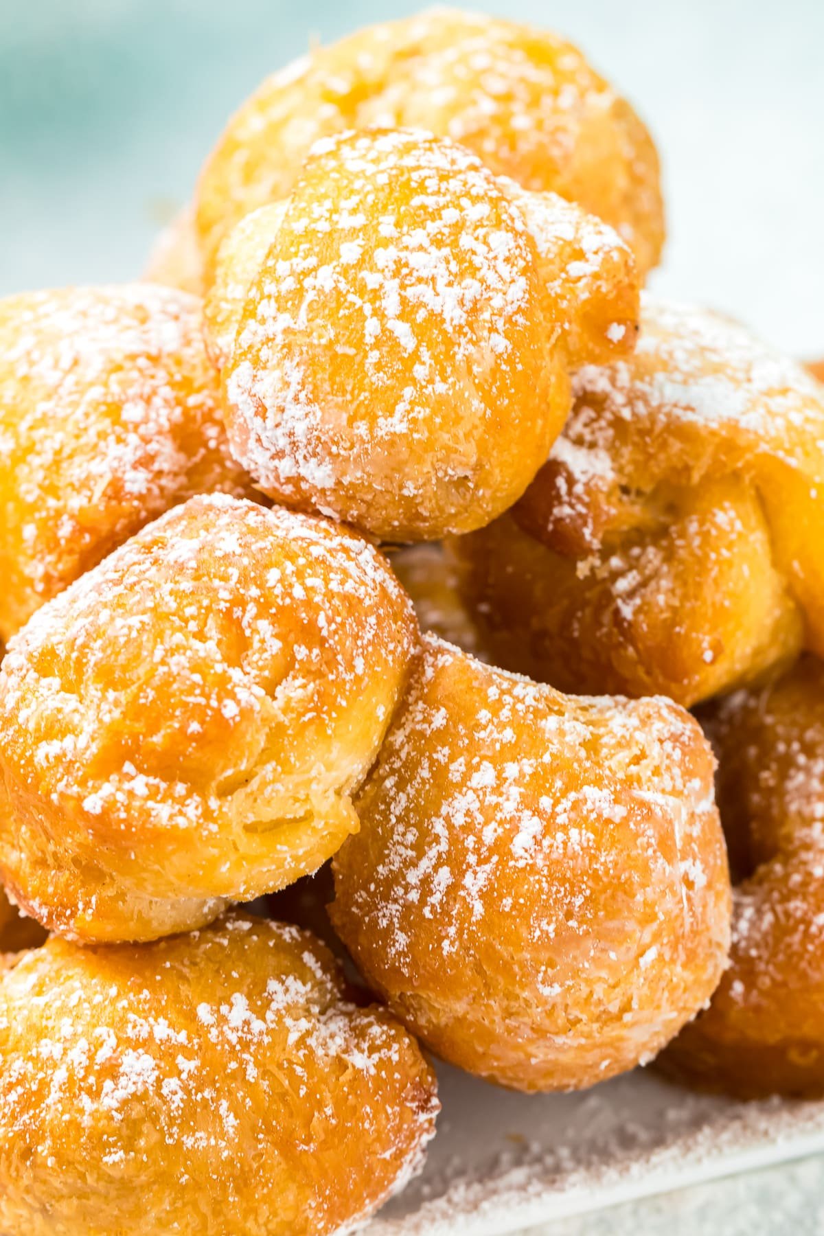 donut holes up close with powdered sugar