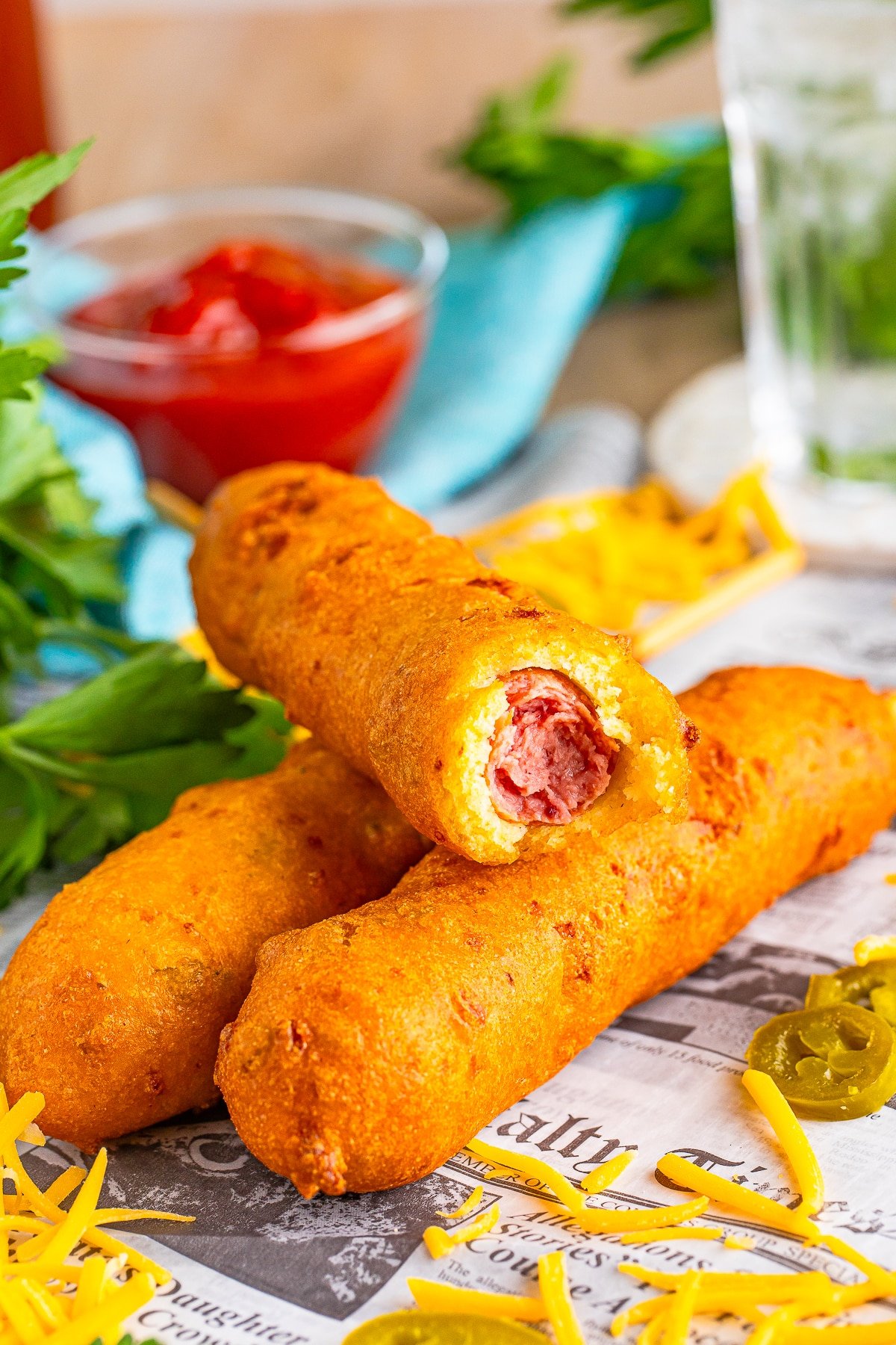 corn dogs recipe stacked with a bite taken out