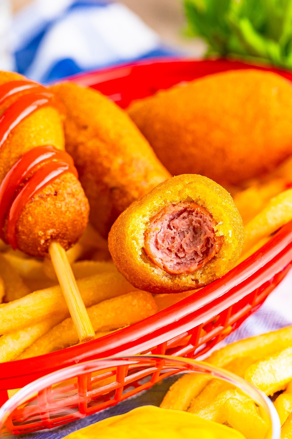 mini corn dogs with a bite taken out