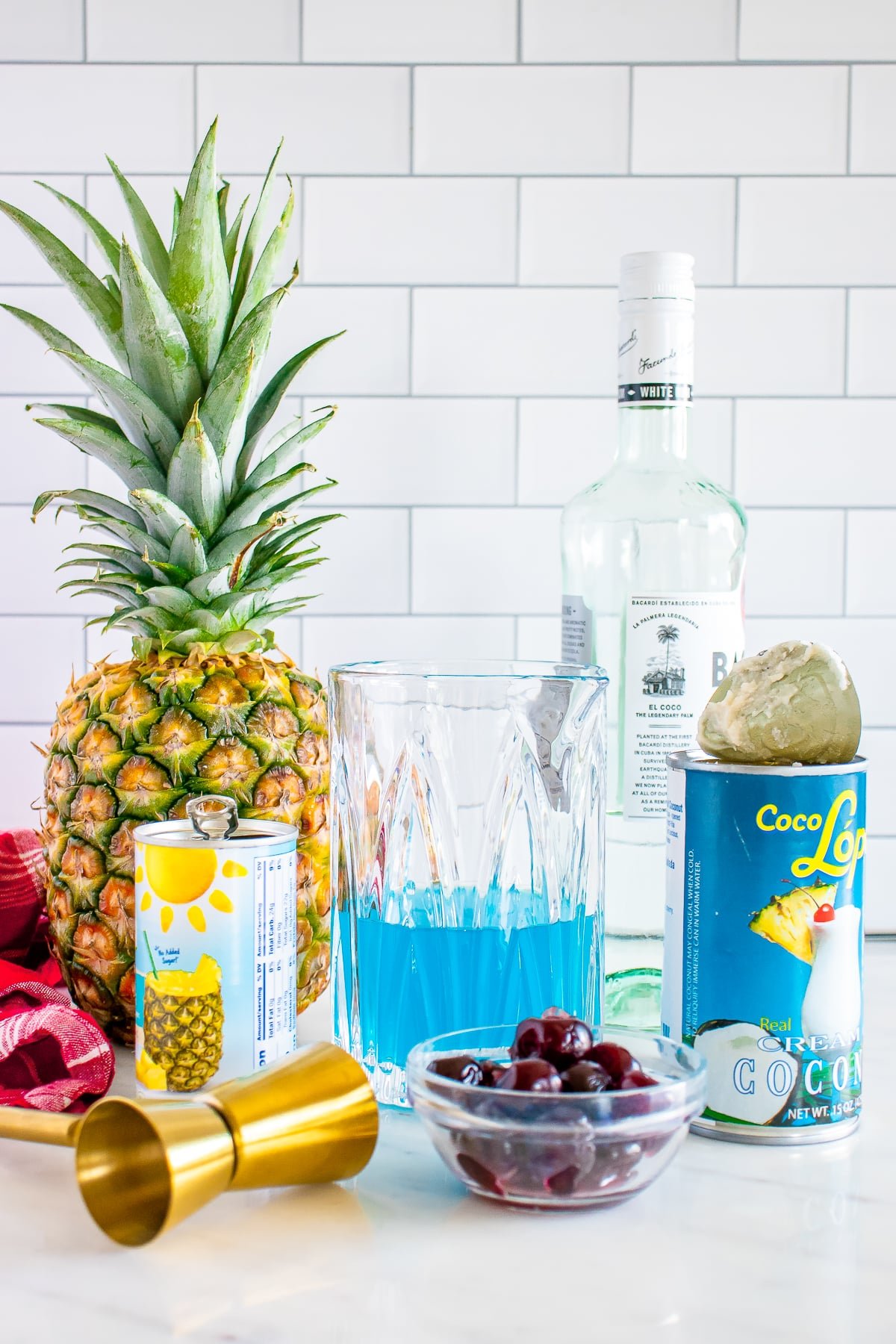ingredients needed to make Blue Hawaiian Cocktail